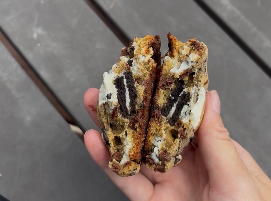 Midnight Goose cookies and cream cookie split open to show stuffed center