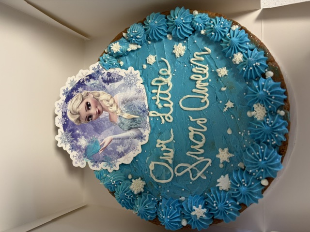 Custom Frozen Elsa 'Our Little Snow Queen' cookie cake with blue buttercream
