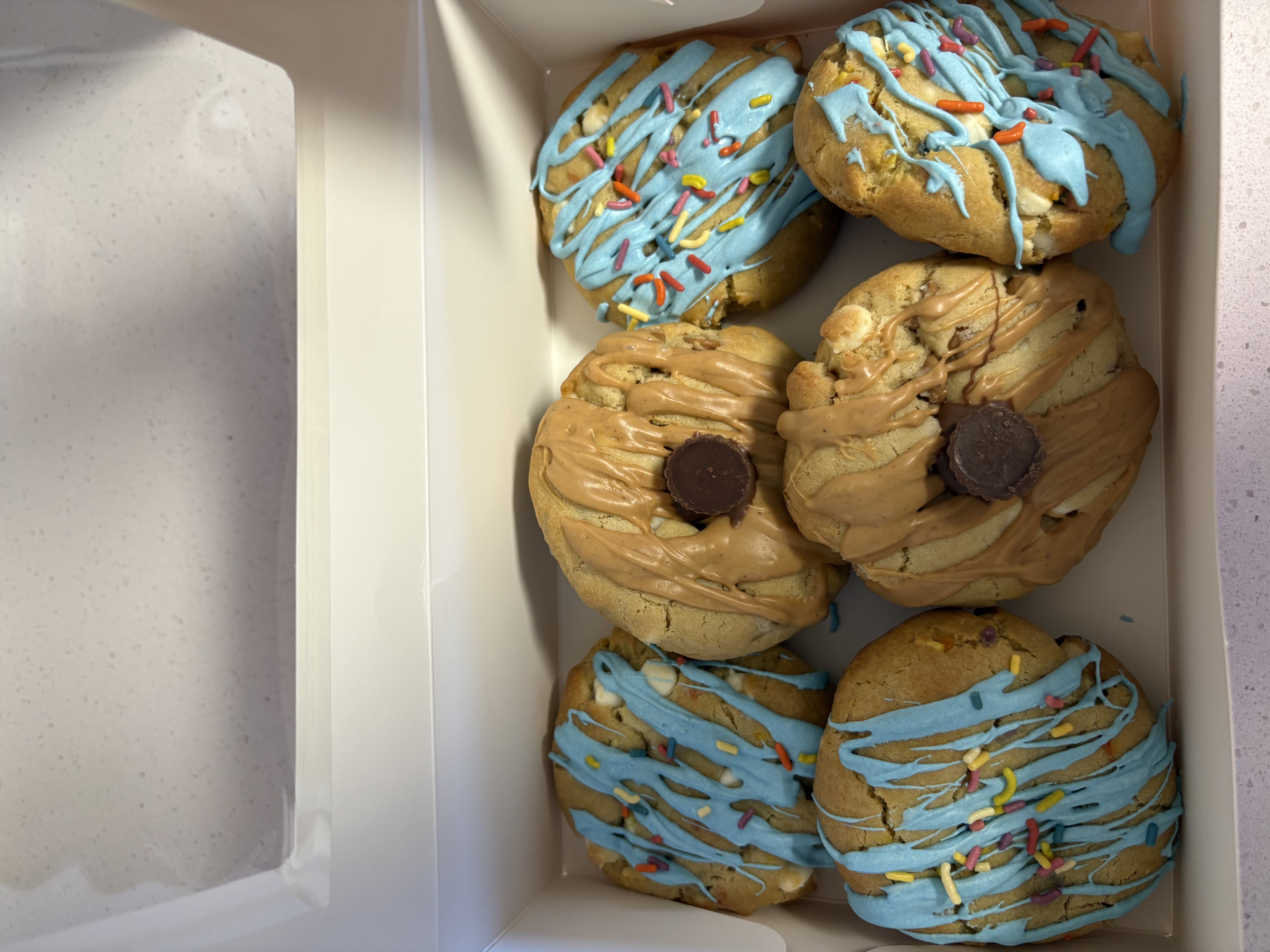 Open Silly Goose Sweets bakery box of stuffed gourmet cookies